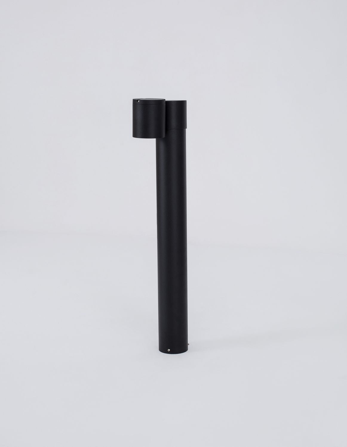 Vue de profil de la borne noire avec sa tête orientable sur support.