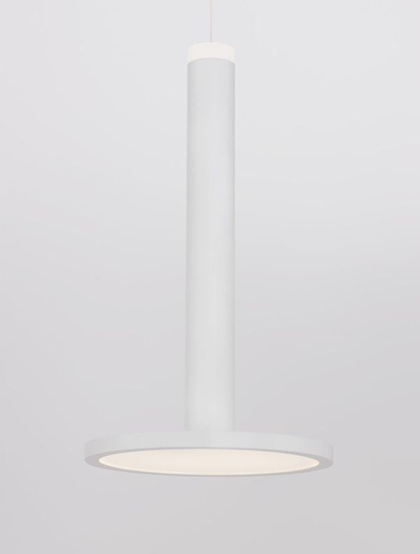 Détail du diffuseur rond éclairé, vu de dessous, lumière chaude