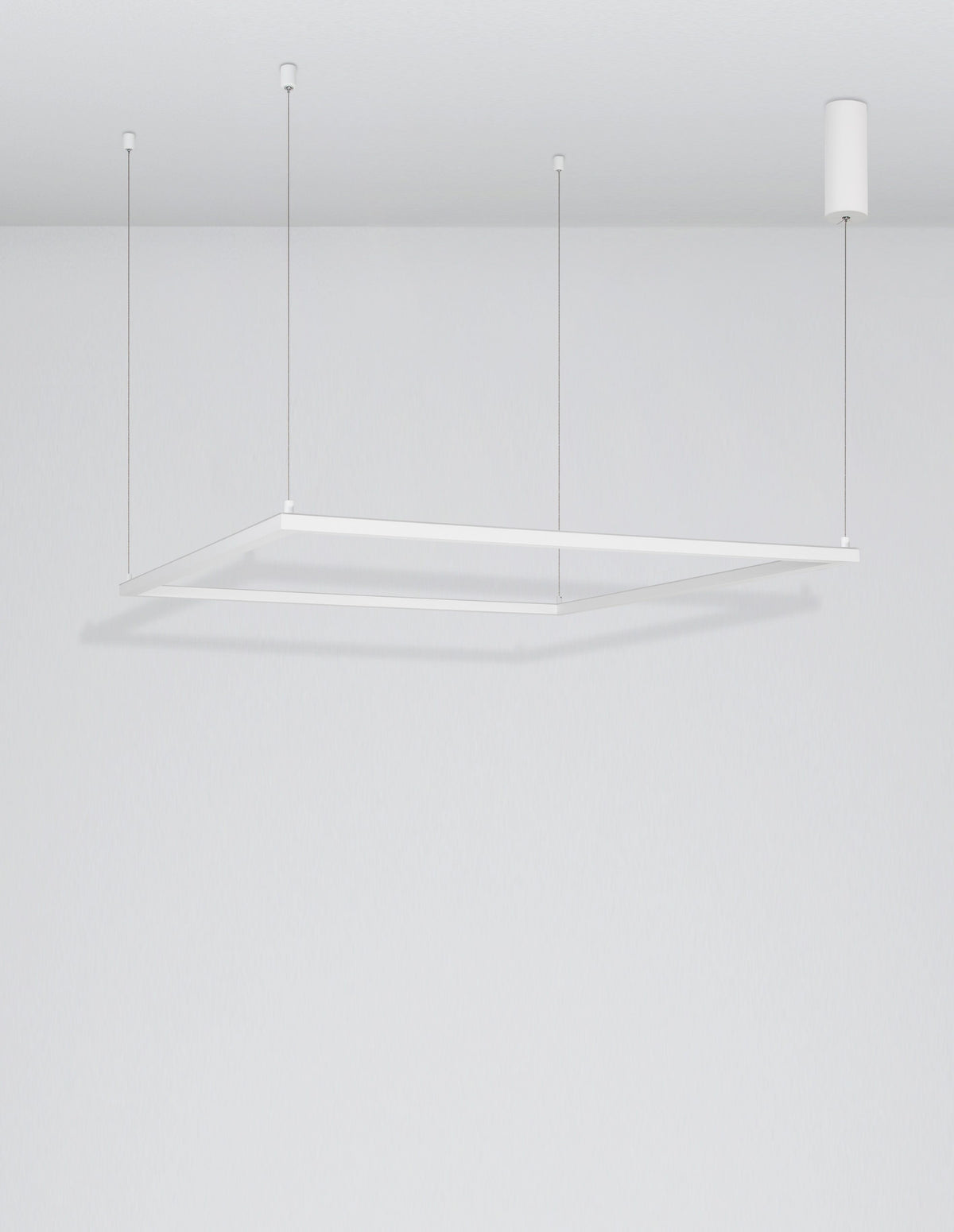 Vue en perspective du luminaire suspendu devant un mur gris clair et neutre