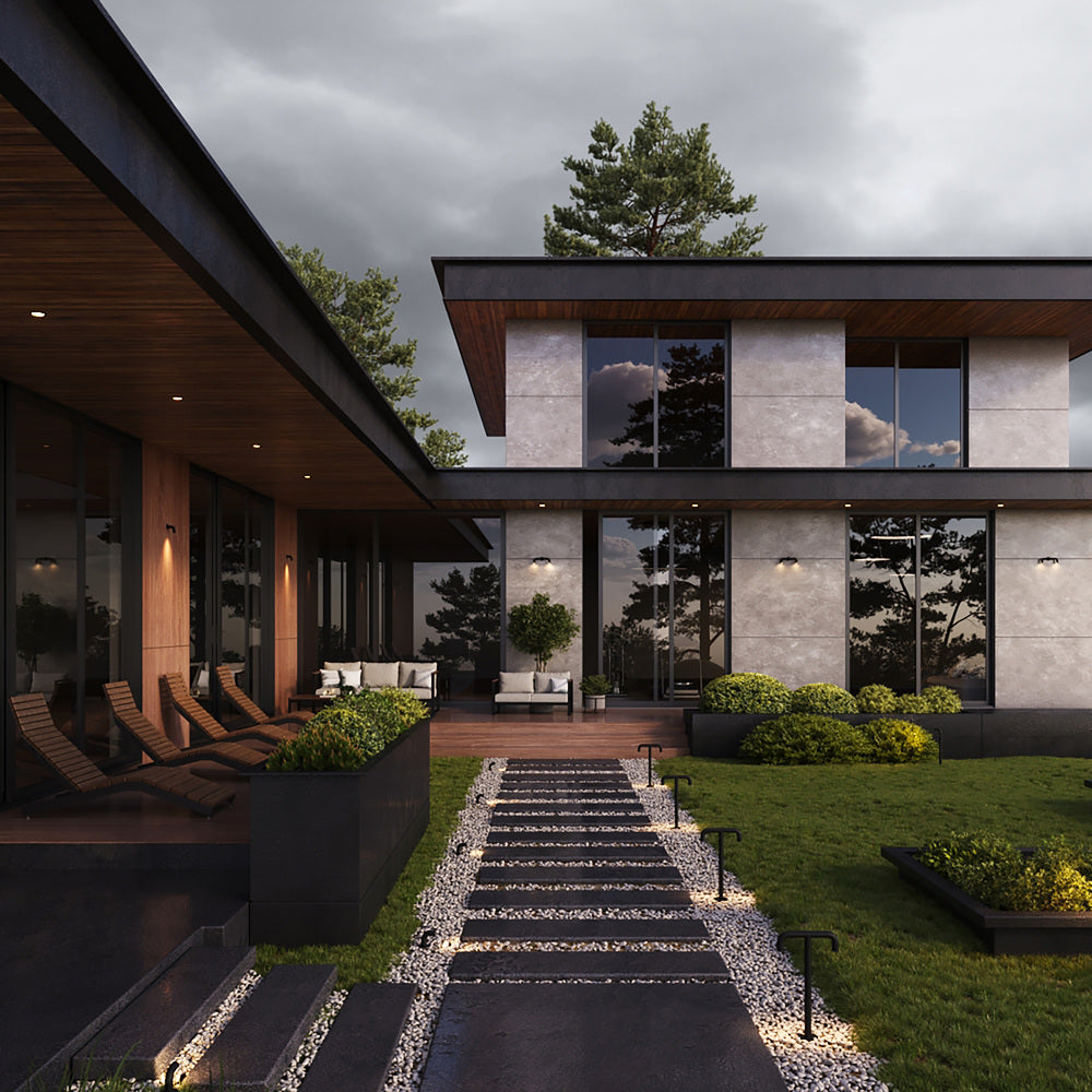 Mise en ambiance nocturne d'une villa moderne, façades et allée éclairées