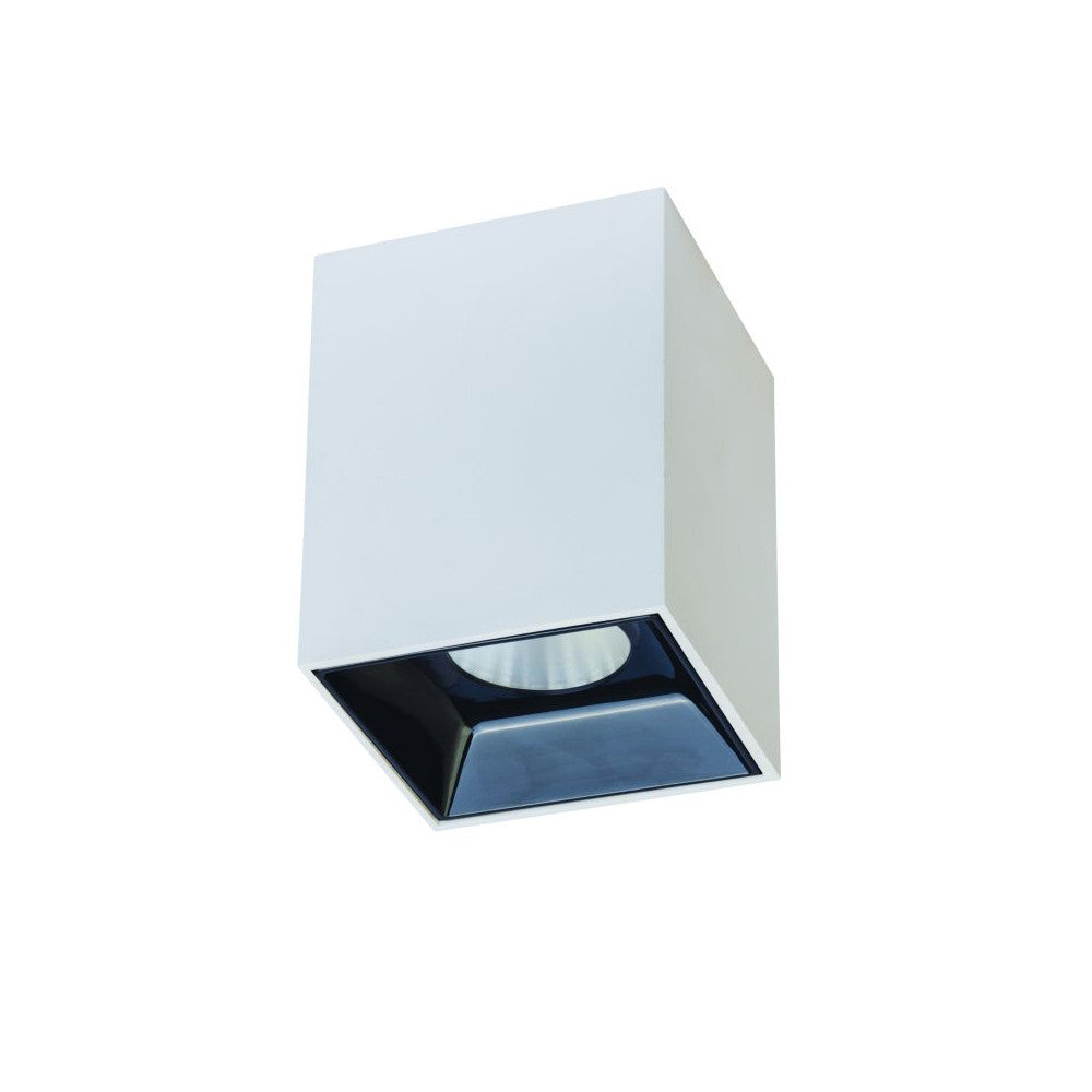 Plafonnier blanc rectangulaire vu de dessous, réflecteur noir et module LED central.