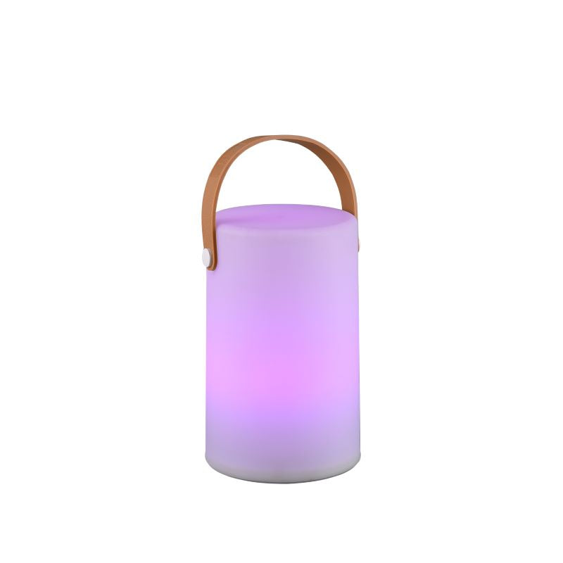 Lampe à poser blanche allumée en violet, halo rosé sur le cylindre dépoli.