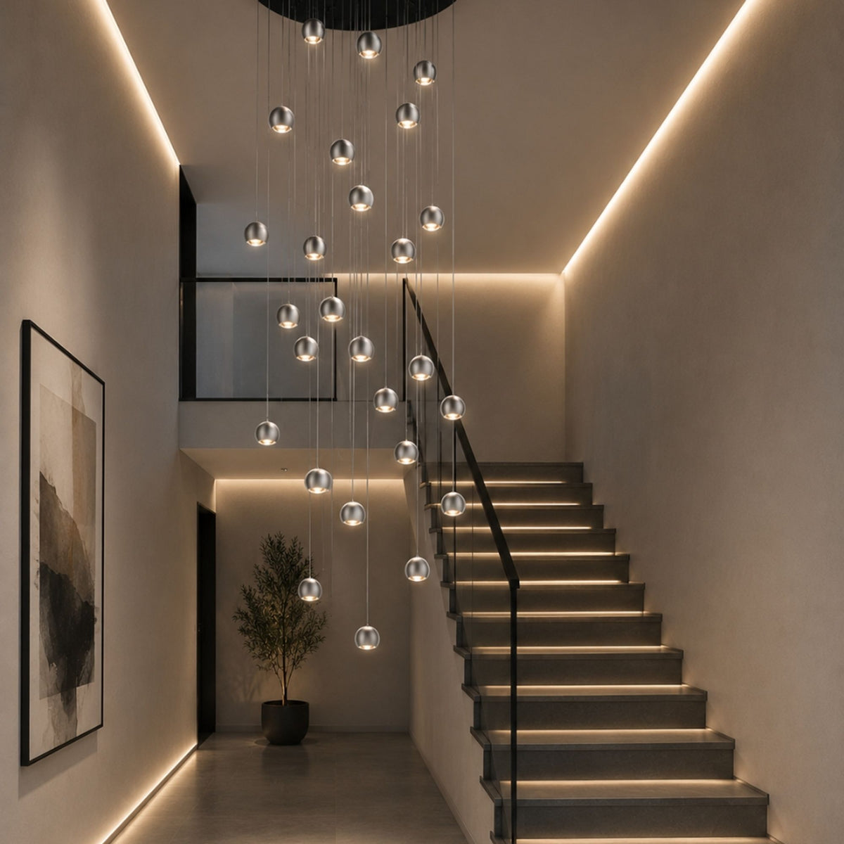 Suspension cascadant dans une cage d'escalier moderne avec de nombreux globes lumineux.