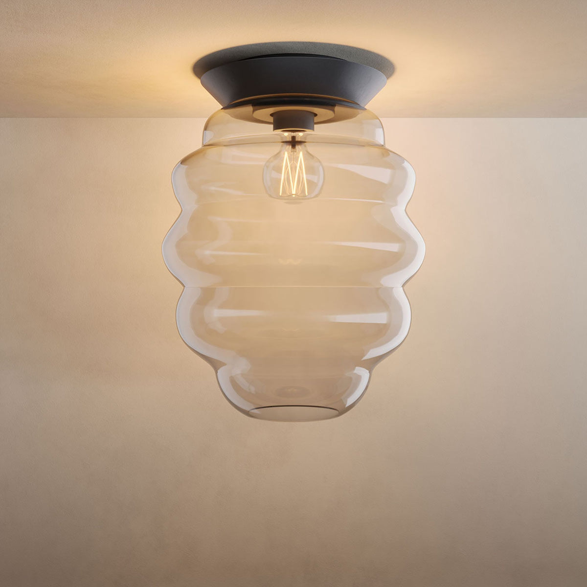 Produit de face, version transparente, diffuseur en verre strié horizontalement.