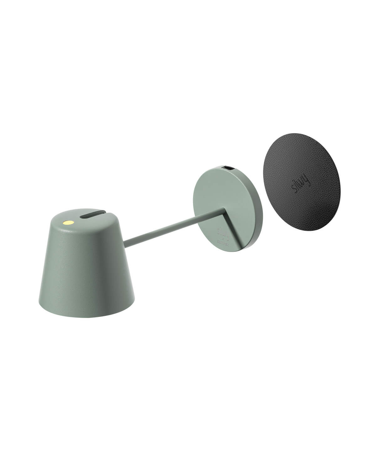 Luminaire incliné, socle rond détaché et pastille noire de fixation à côté