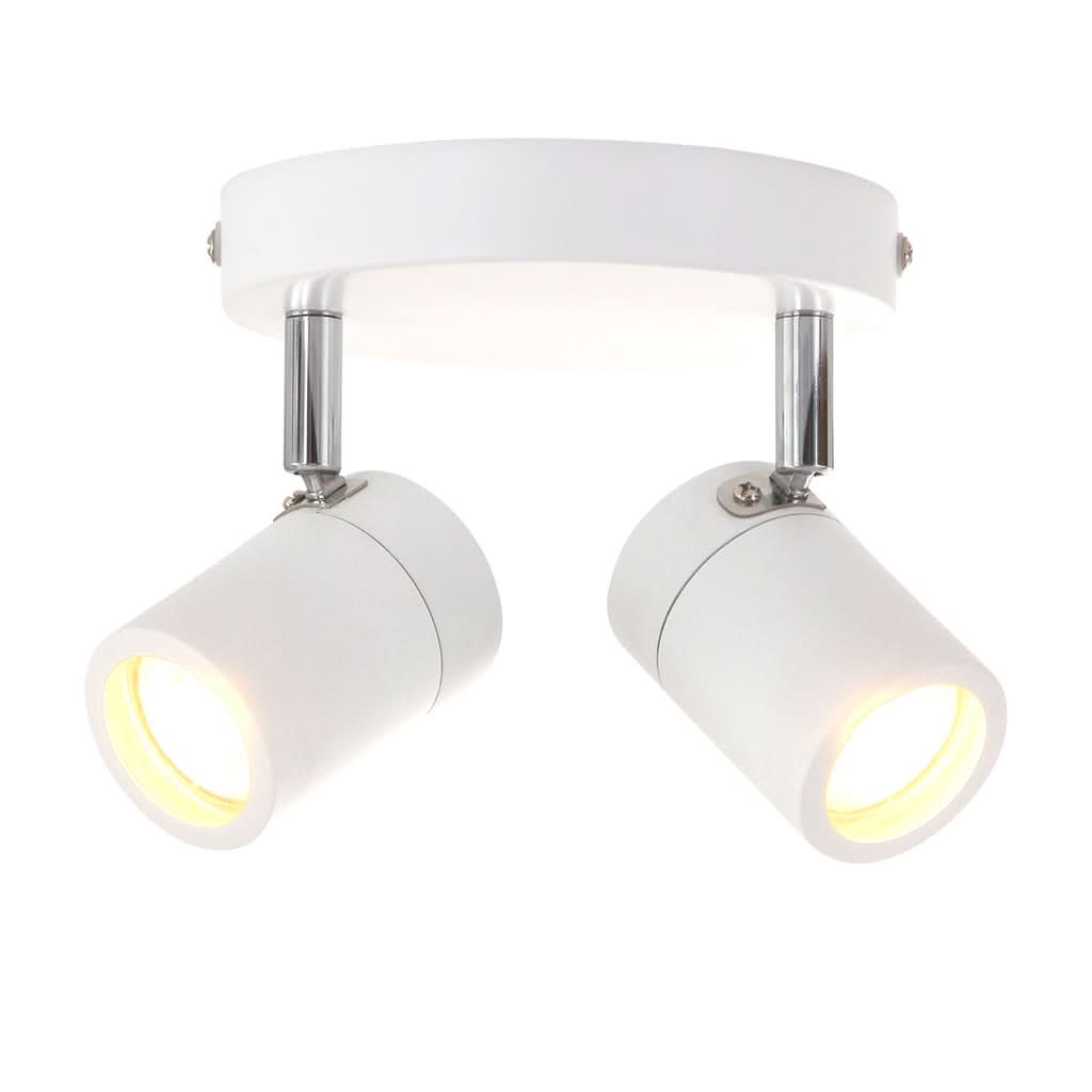 Spot LED blanc à deux têtes cylindriques orientables, allumé, sur fond blanc