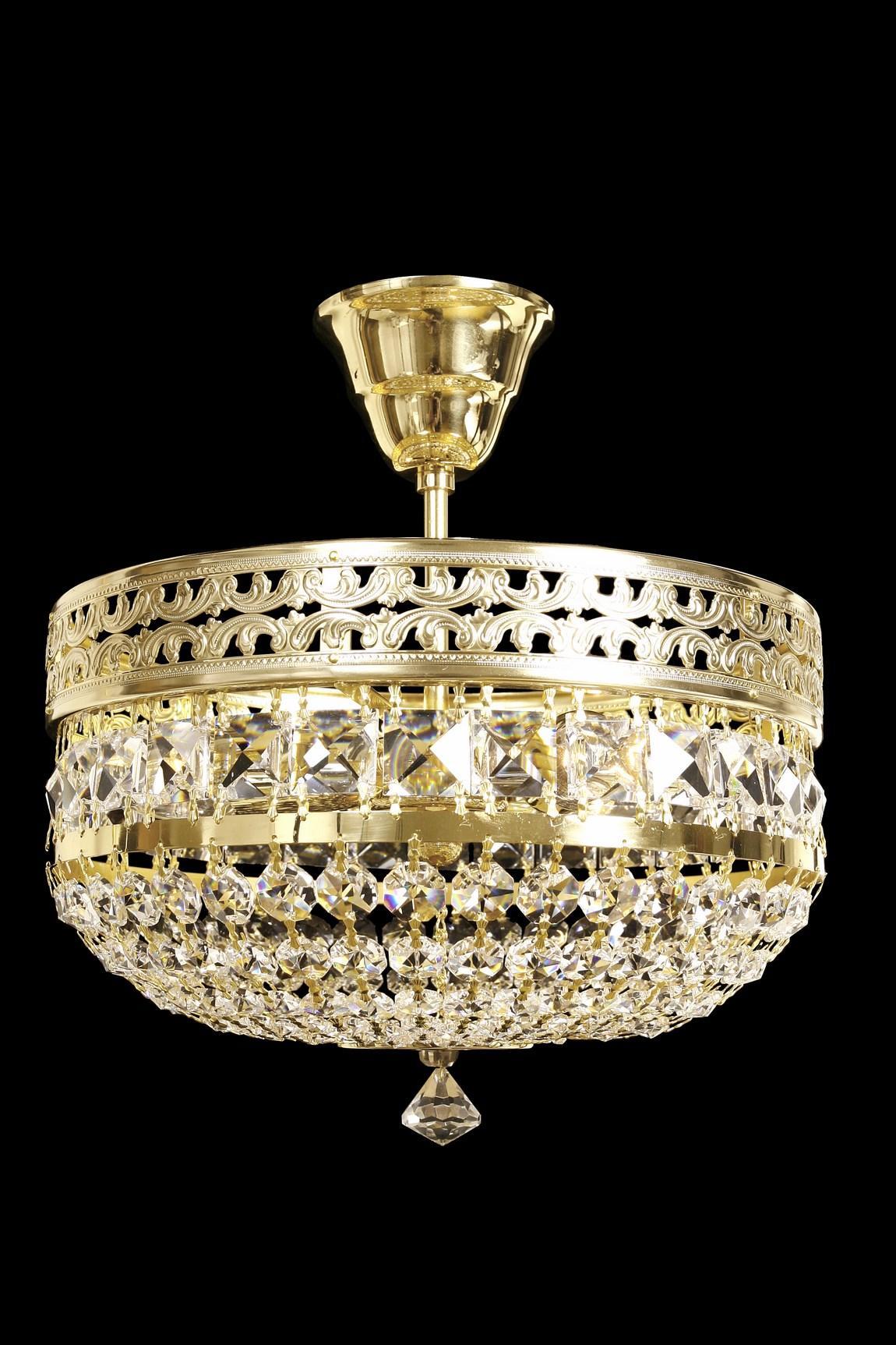 Plafonnier doré rond en cristal, vue de face sur fond noir