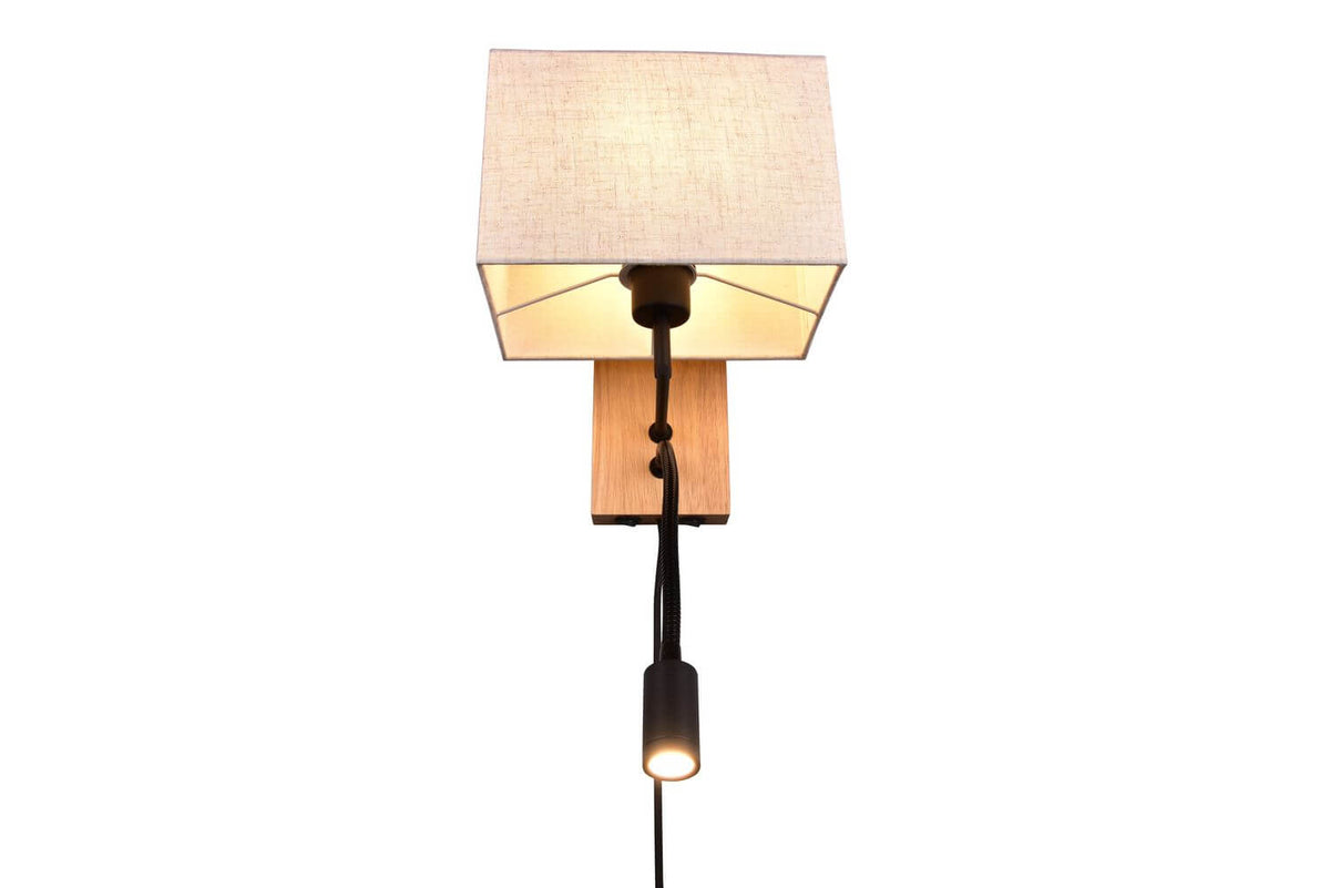 Vue en contre-plongée montrant l'intérieur éclairé de l'abat-jour et le flexible noir.