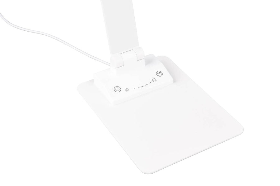 Détail du socle blanc avec boutons tactiles et symboles de réglage d'intensité.