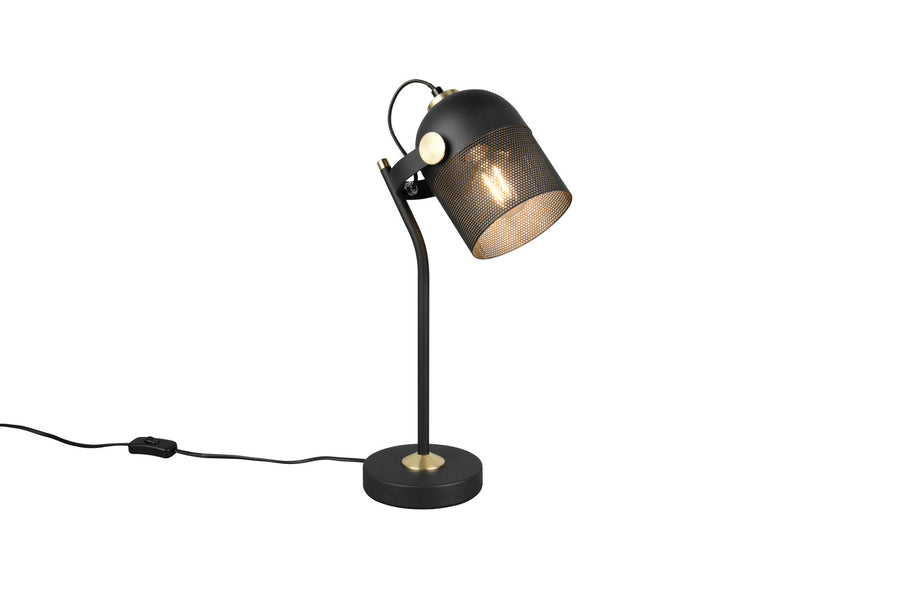 Vue de profil de la lampe, abat-jour perforé diffusant une lumière chaude