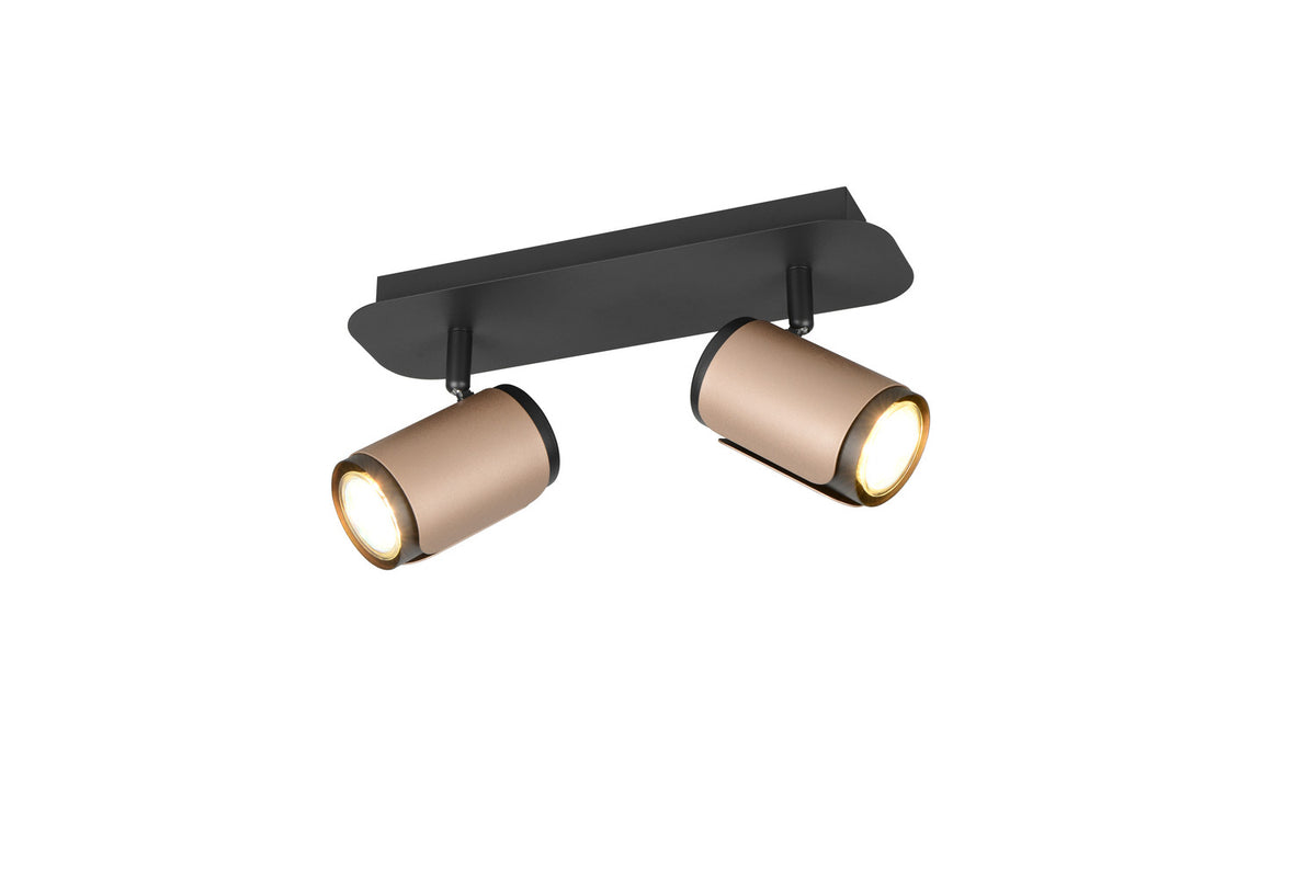 Luminaire de plafond à deux projecteurs cylindriques beige inclinés sur platine noire allumée