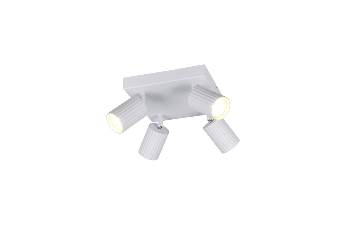 Vue rapprochée des quatre cylindres striés orientables, plafonnier blanc mat allumé