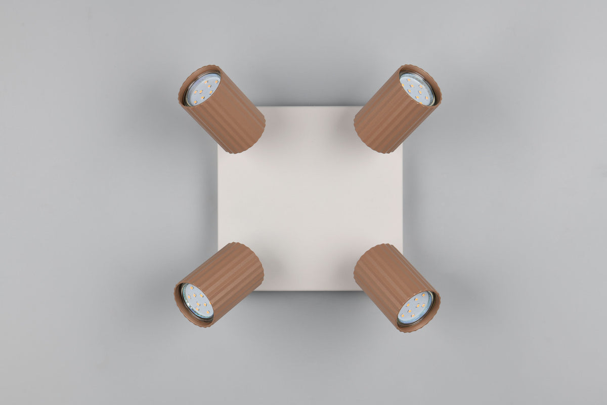 Vue de dessus sur fond gris montrant les quatre modules LED éteints