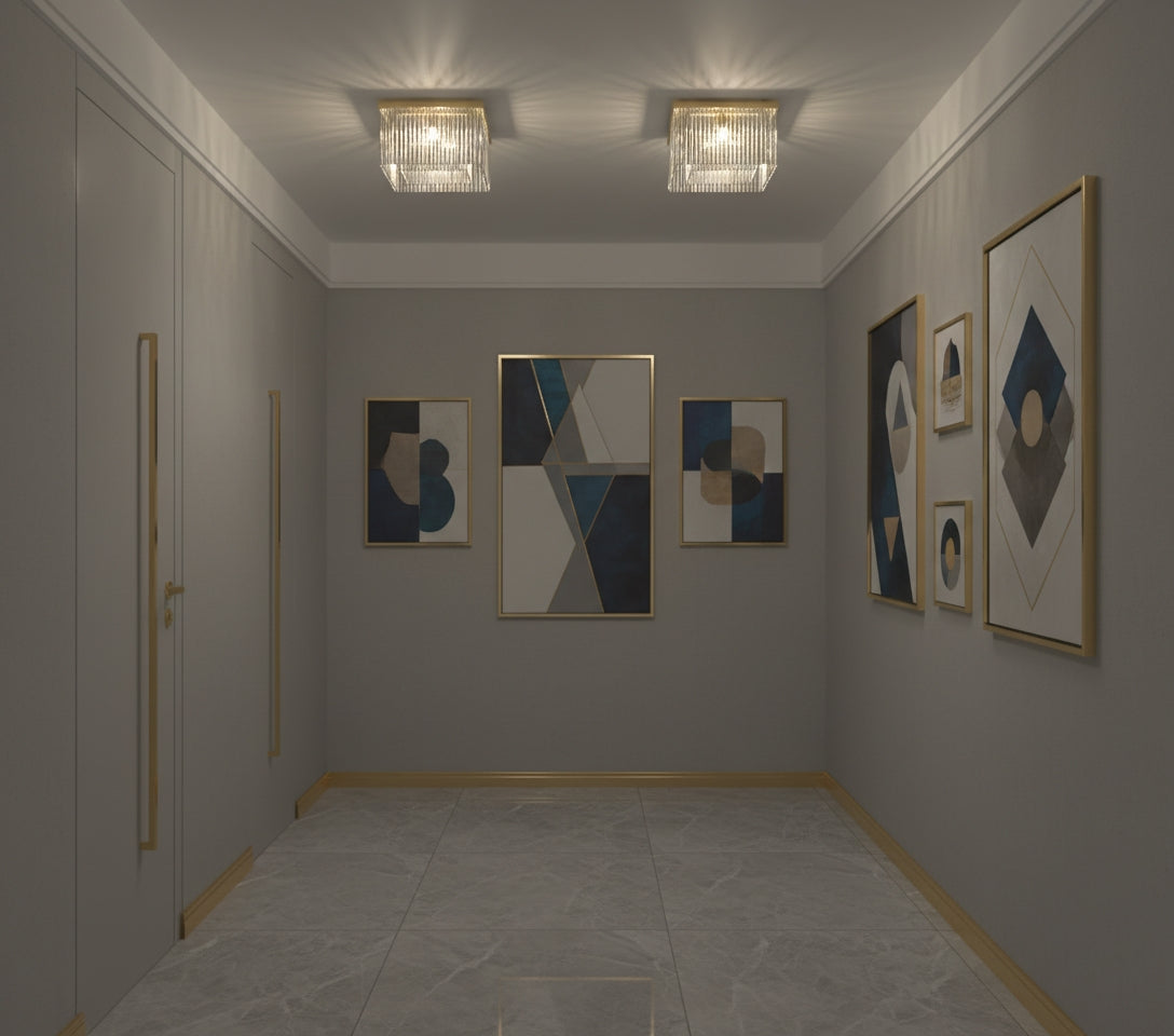 Deux exemplaires du plafonnier éclairent un couloir gris aux tableaux géométriques.