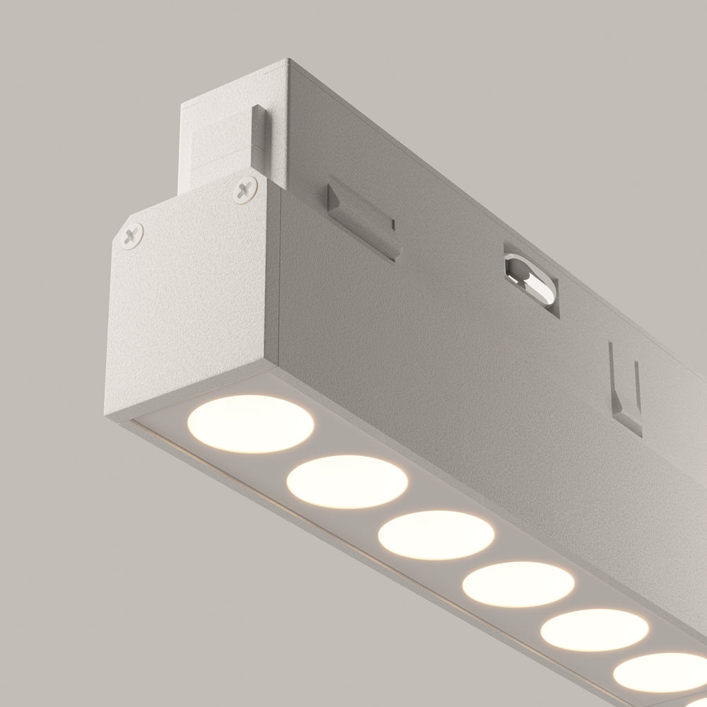 Détail rapproché du module blanc et de ses diodes rondes en fonctionnement