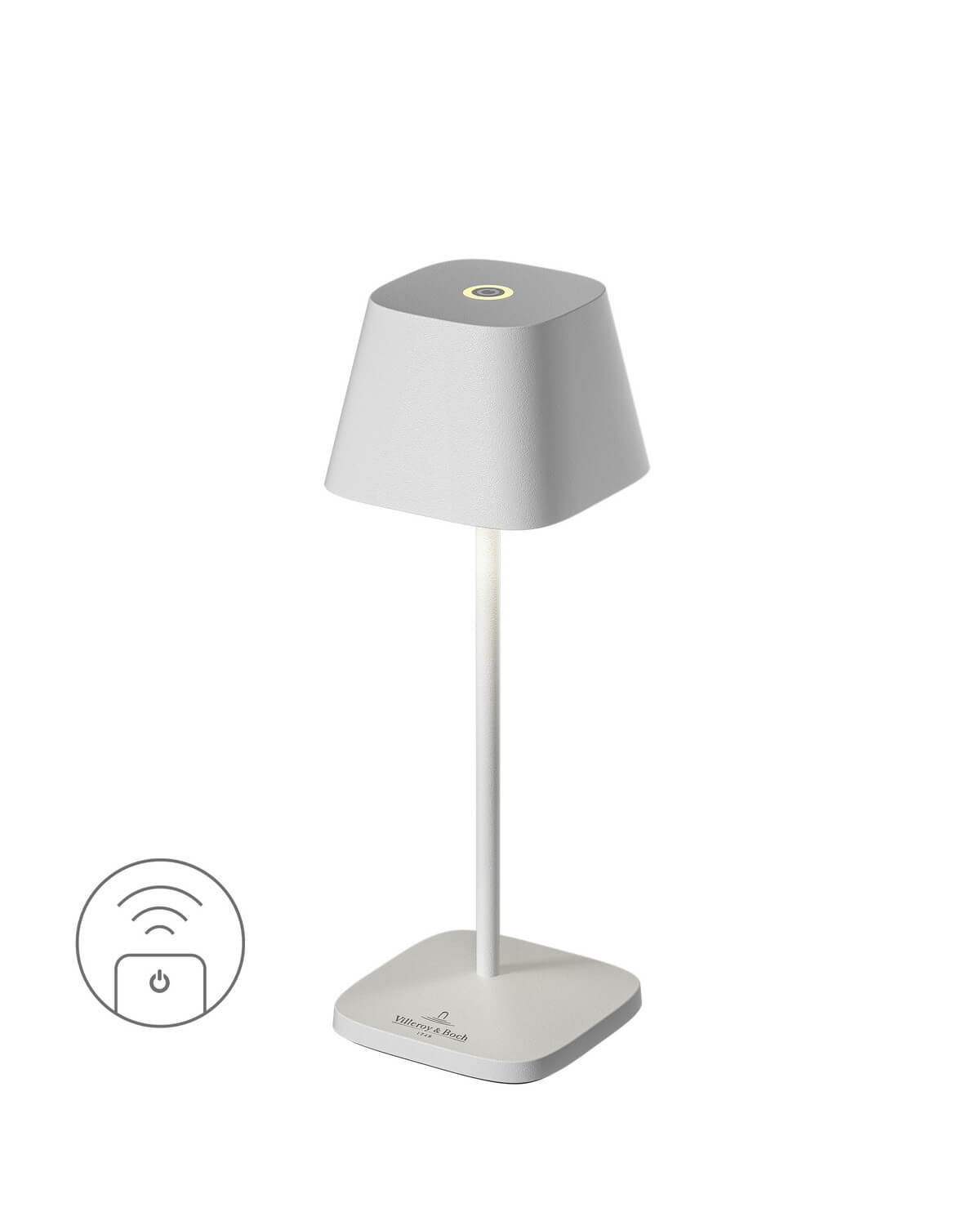 Vue en trois quarts d'une lampe blanche à poser, avec icône de télécommande.