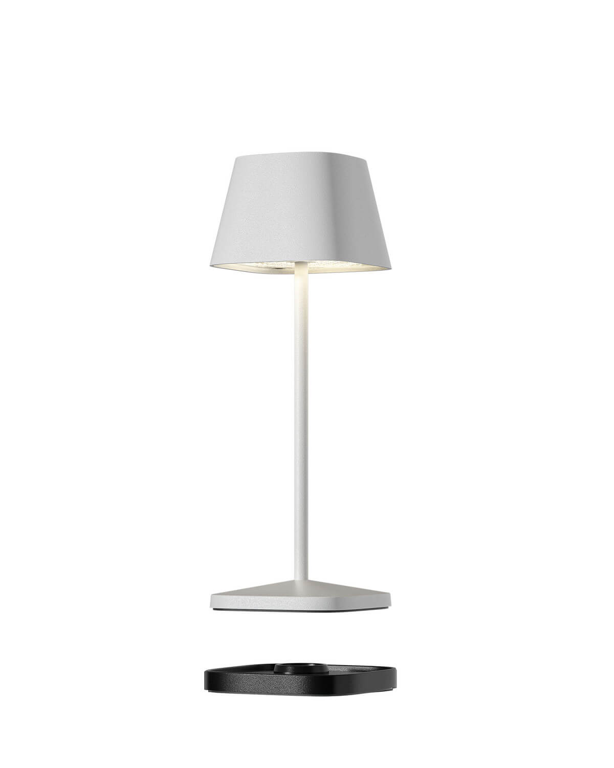 Vue de profil montrant la lampe blanche et sa base de recharge noire détachée.