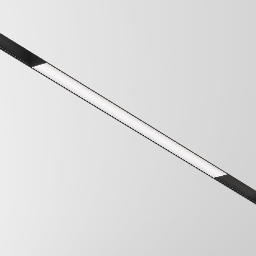 Barre noire allongée avec diffuseur blanc, vue de face sur fond gris