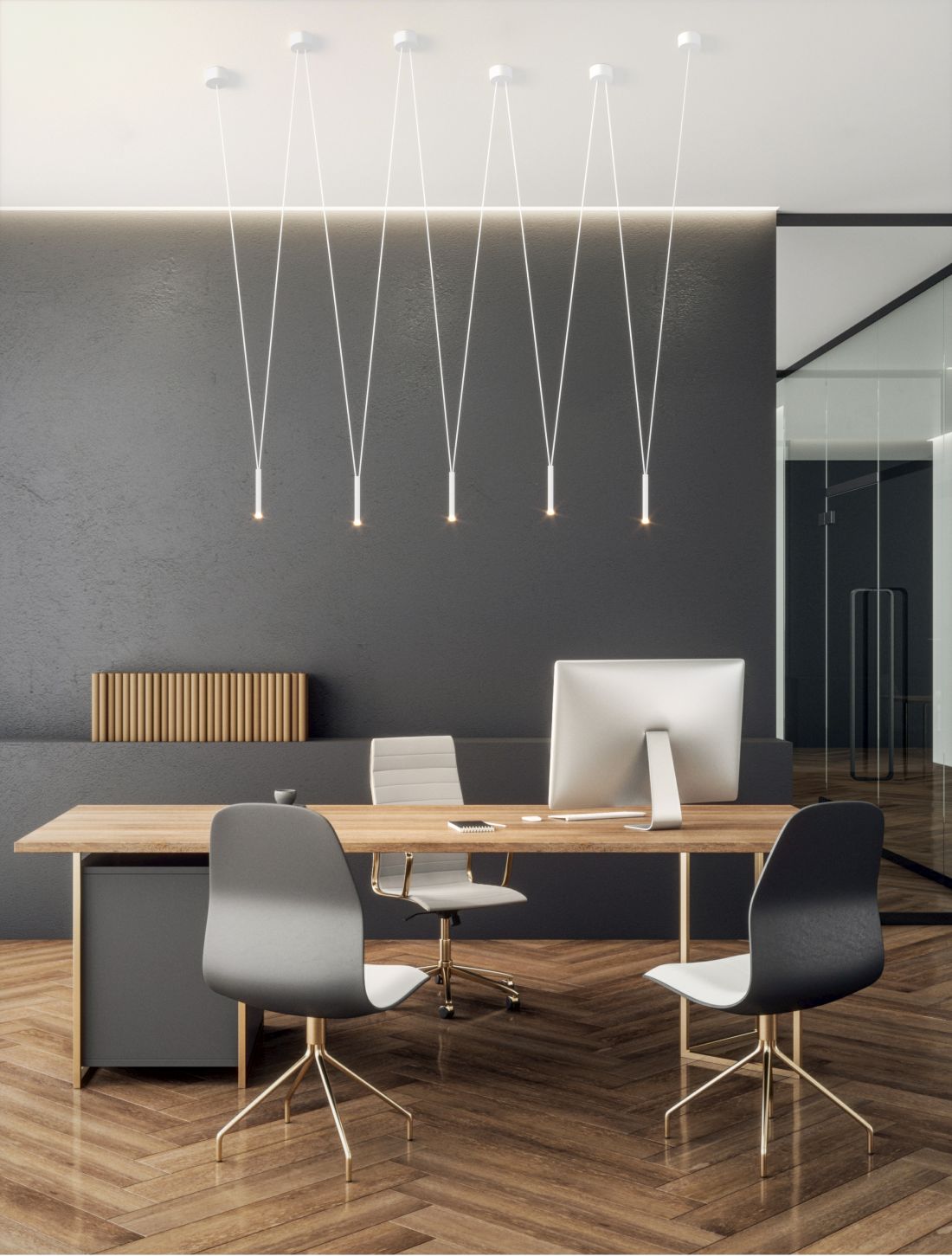 Mise en ambiance du luminaire suspendu au-dessus d'un bureau dans un intérieur contemporain