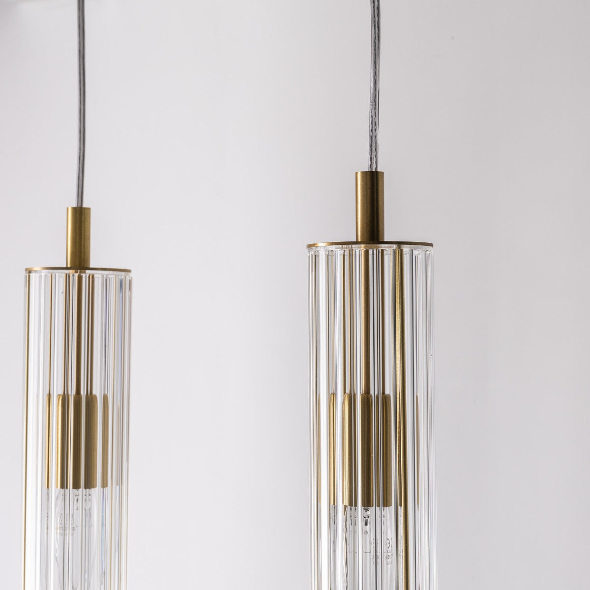 Suspension Aria 4 lumières laiton brossé, verre