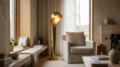 Design-Stehleuchten in Goldfarben