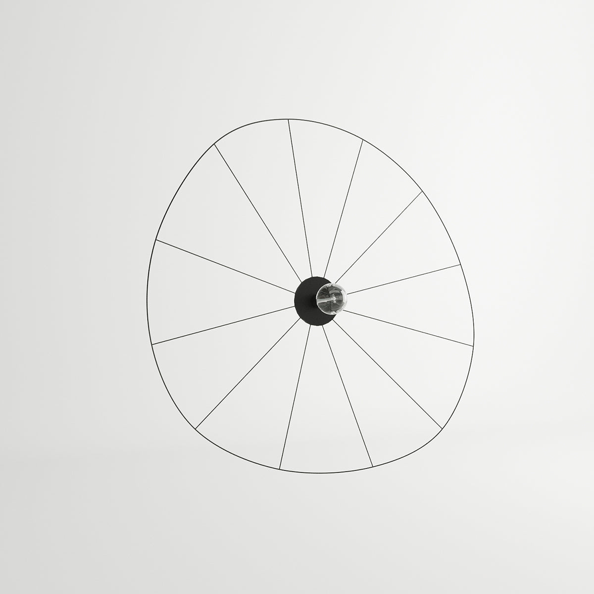 Vue de face du luminaire rond, cercles et rayons métalliques noirs sur fond blanc