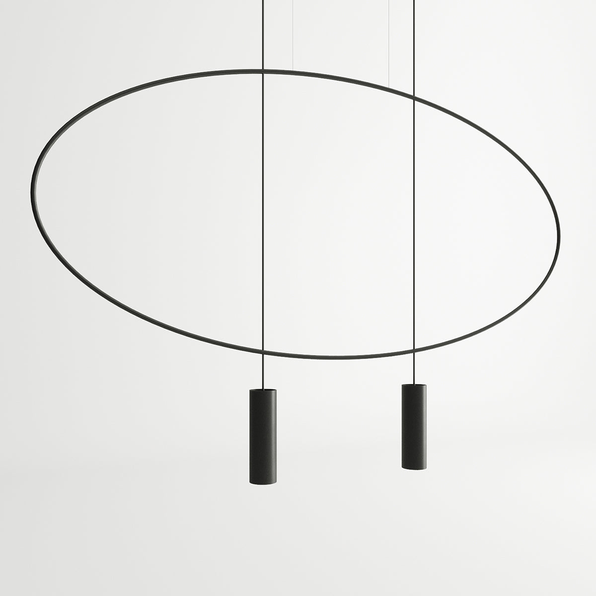 Détail rapproché de l'anneau fin noir et des cylindres pendants