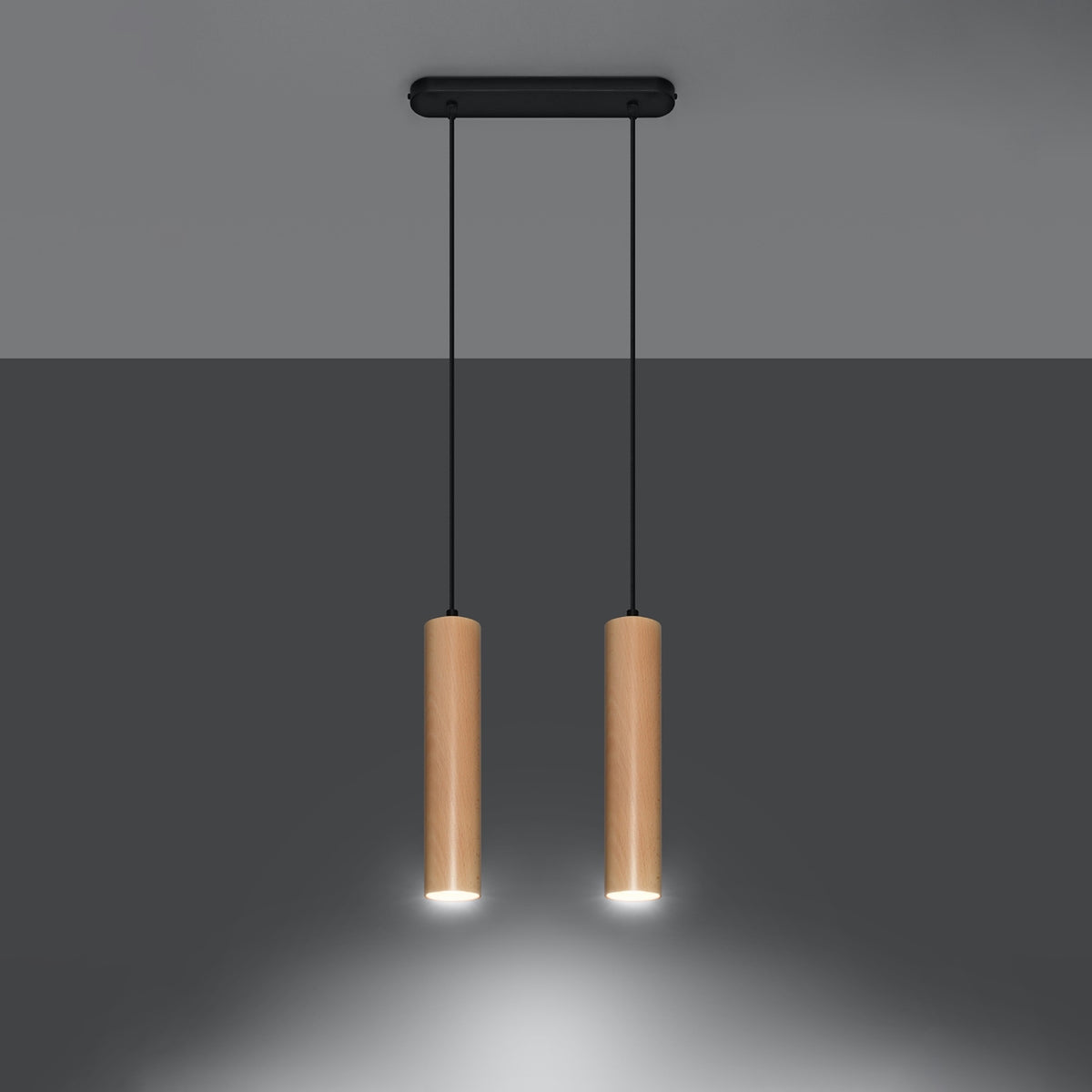 Mise en ambiance des suspensions allumées projetant une lumière chaude vers le bas.