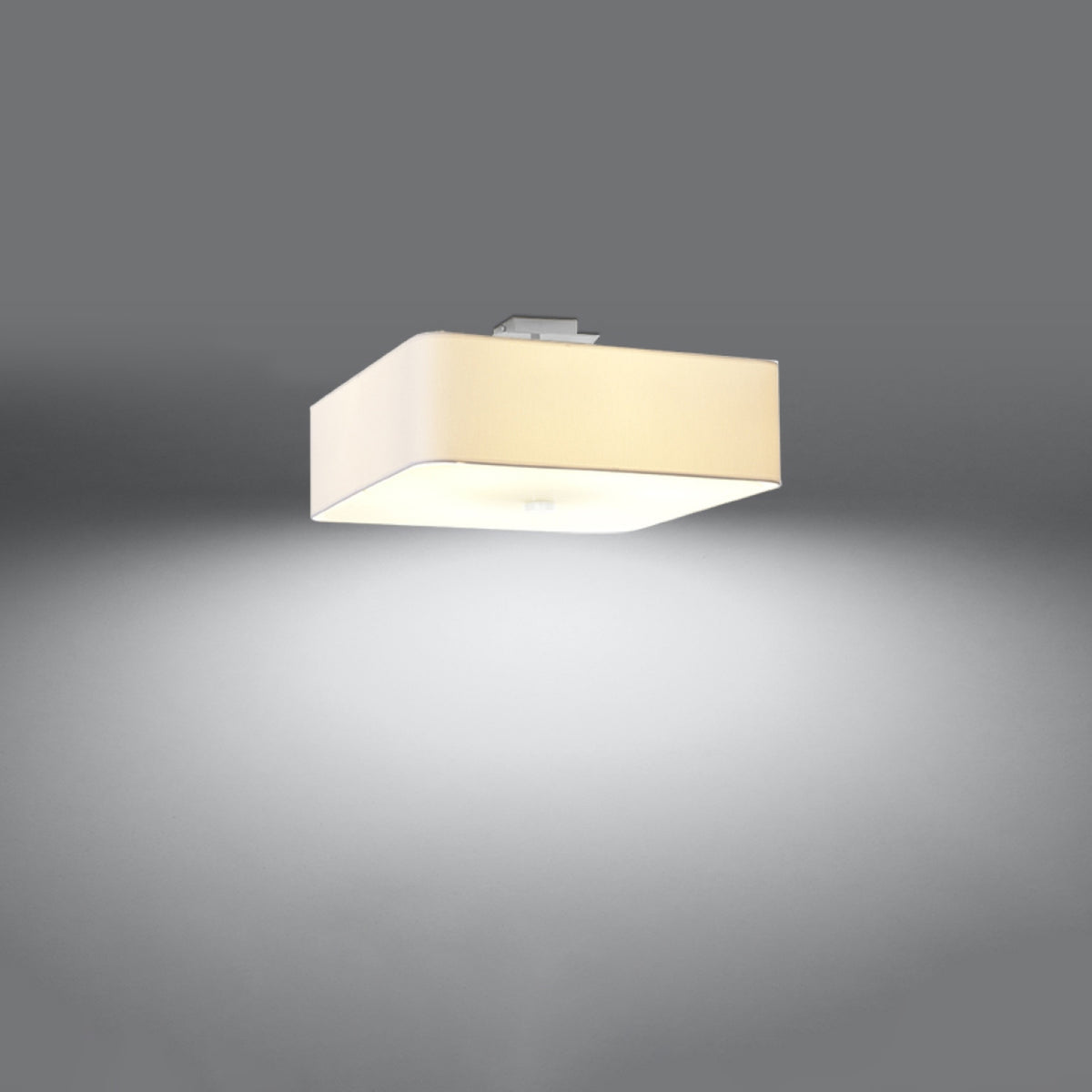 Diffuseur allumé projetant une lumière chaude et un halo diffus dans la pièce