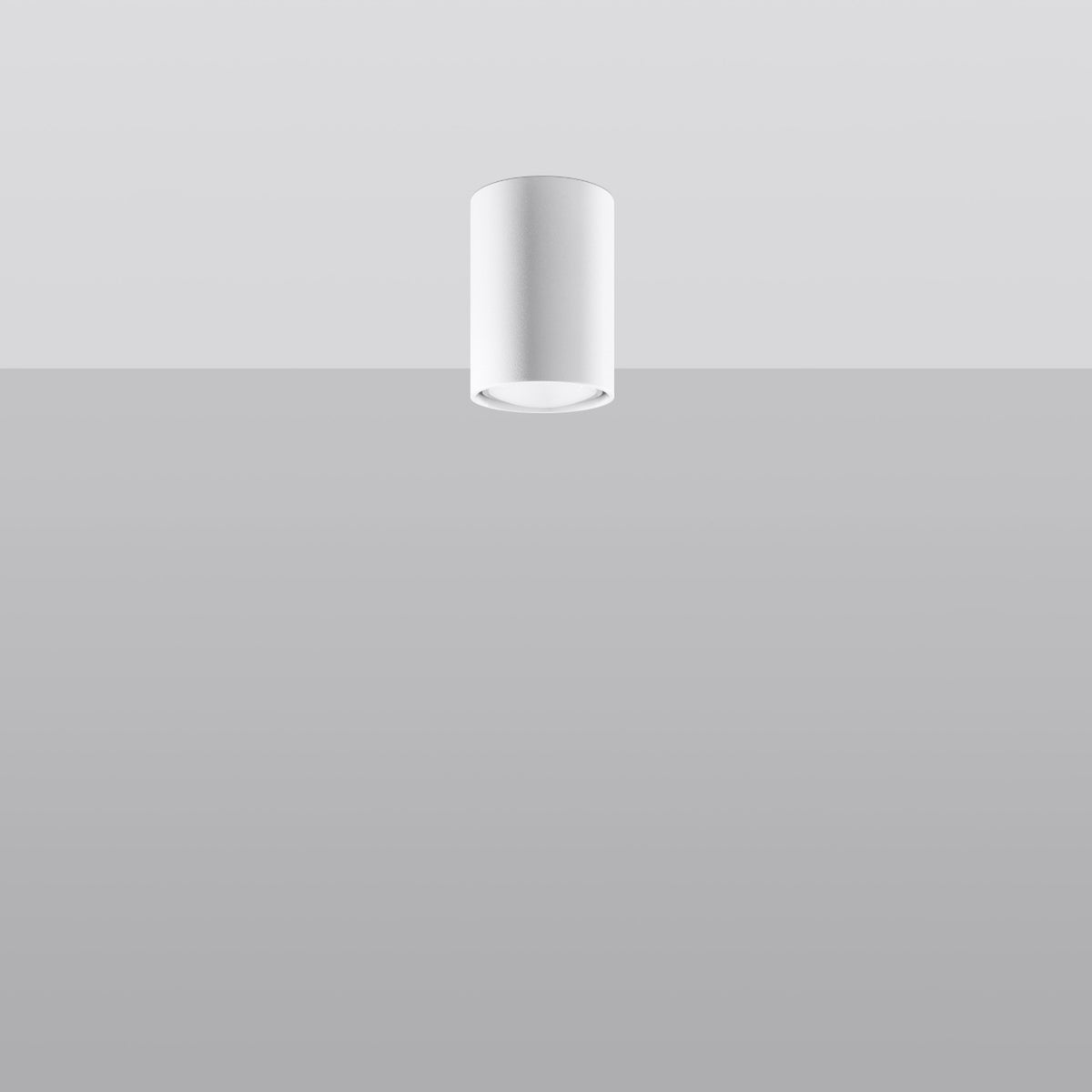 Vue en situation d’un plafonnier blanc cylindrique fixé au plafond, éclairage éteint.