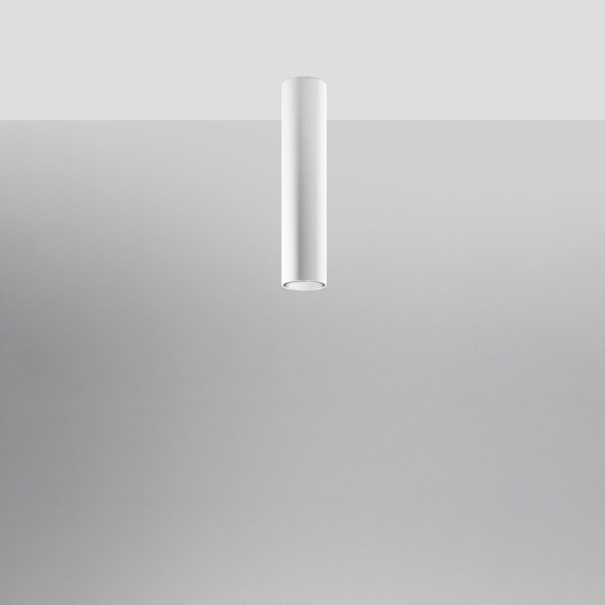 Le cylindre blanc fixé au plafond vu de profil, lumière éteinte sur fond gris