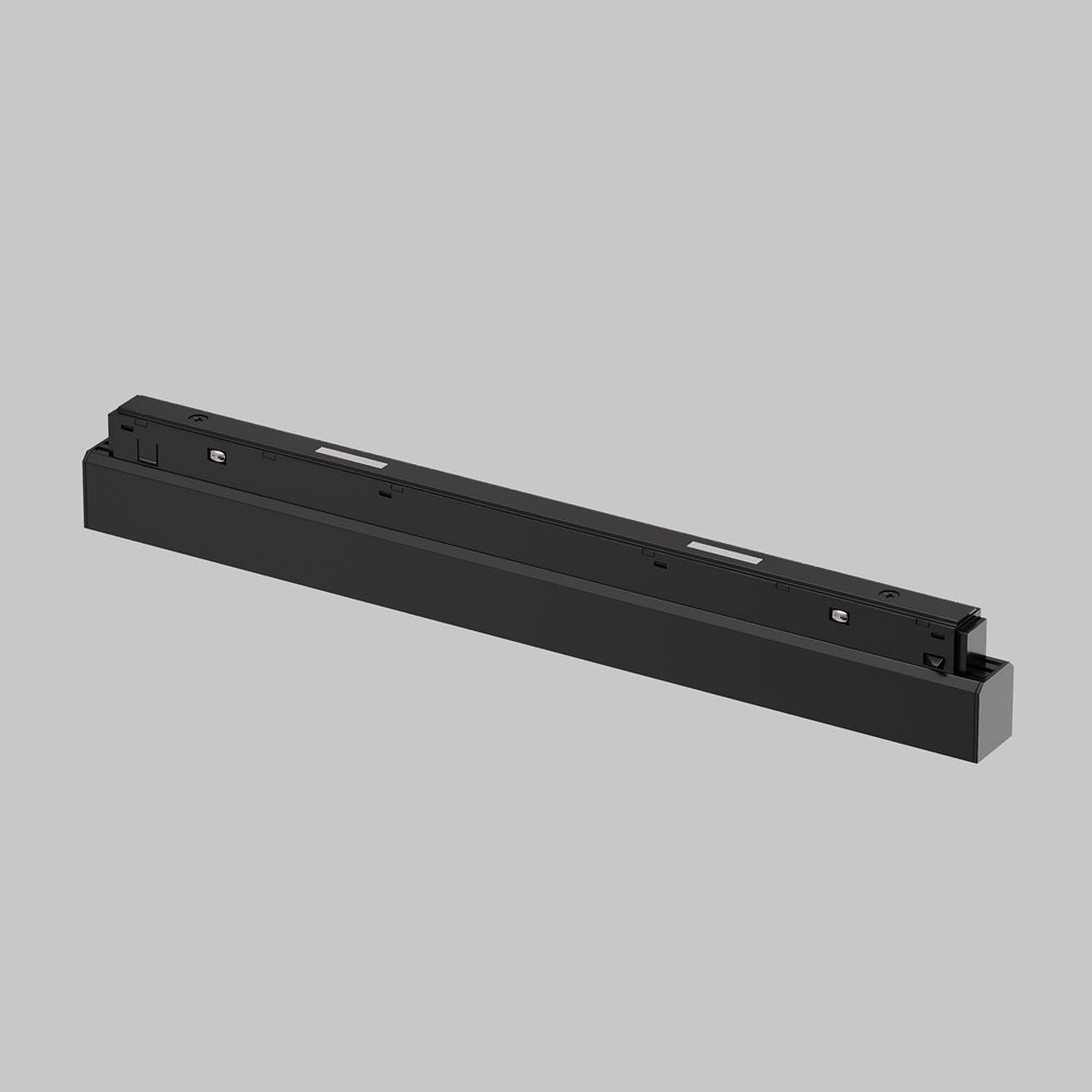 Vue arrière du boîtier noir allongé, montrant les fixations et le profil rectangulaire.