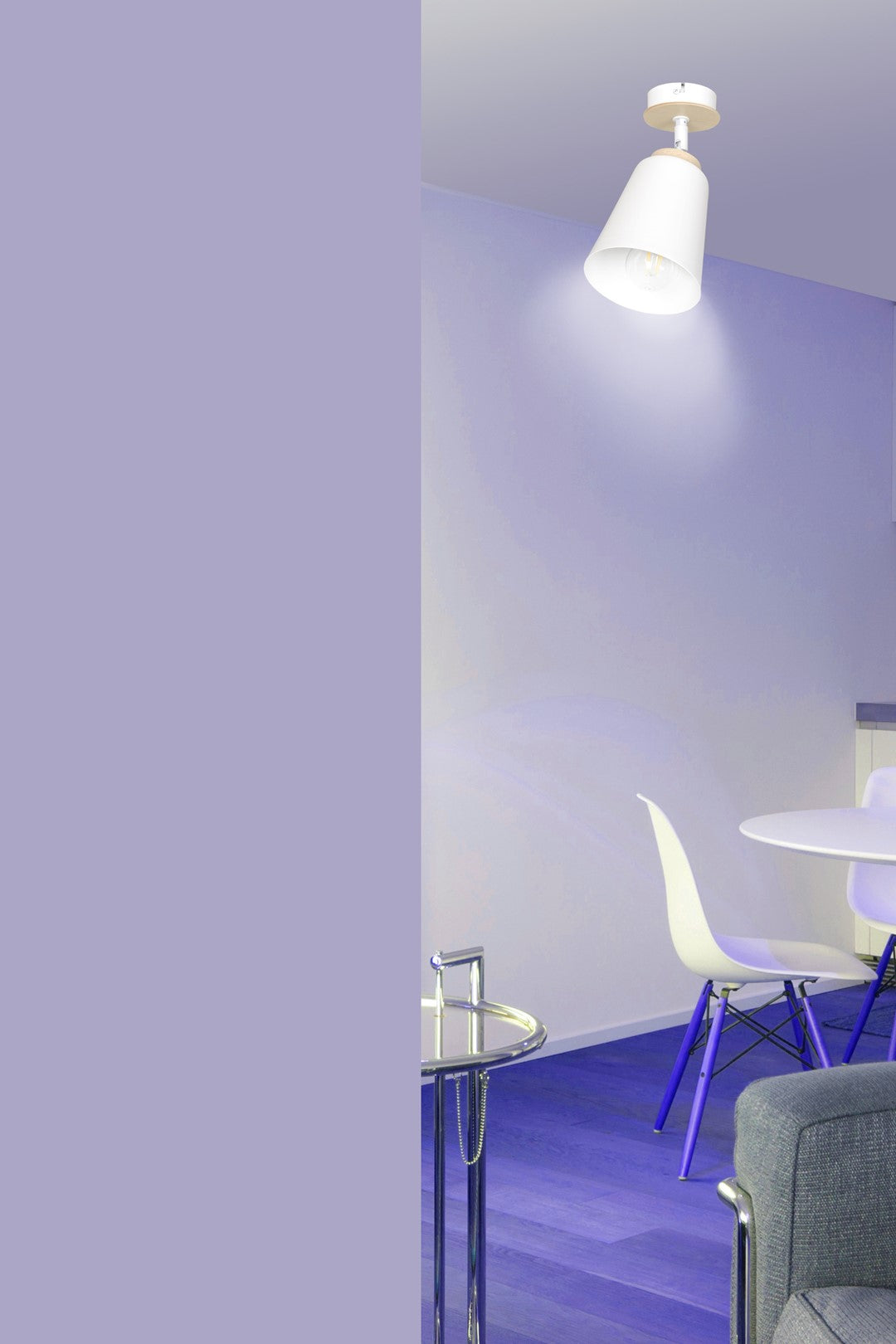 Mise en ambiance dans un intérieur violet avec table ronde et chaises blanches