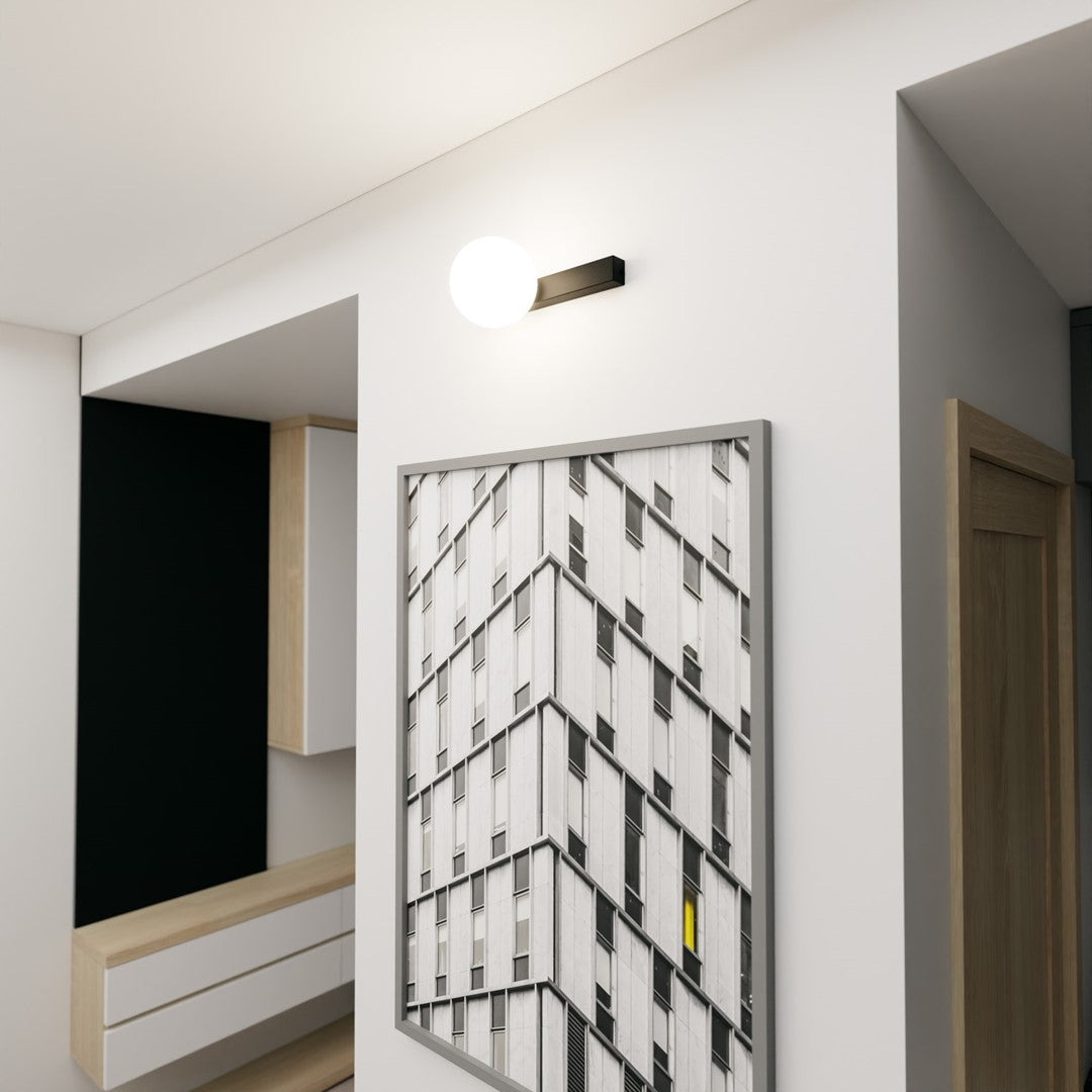Luminaire installé au mur au-dessus d'un cadre, rendu d'ambiance