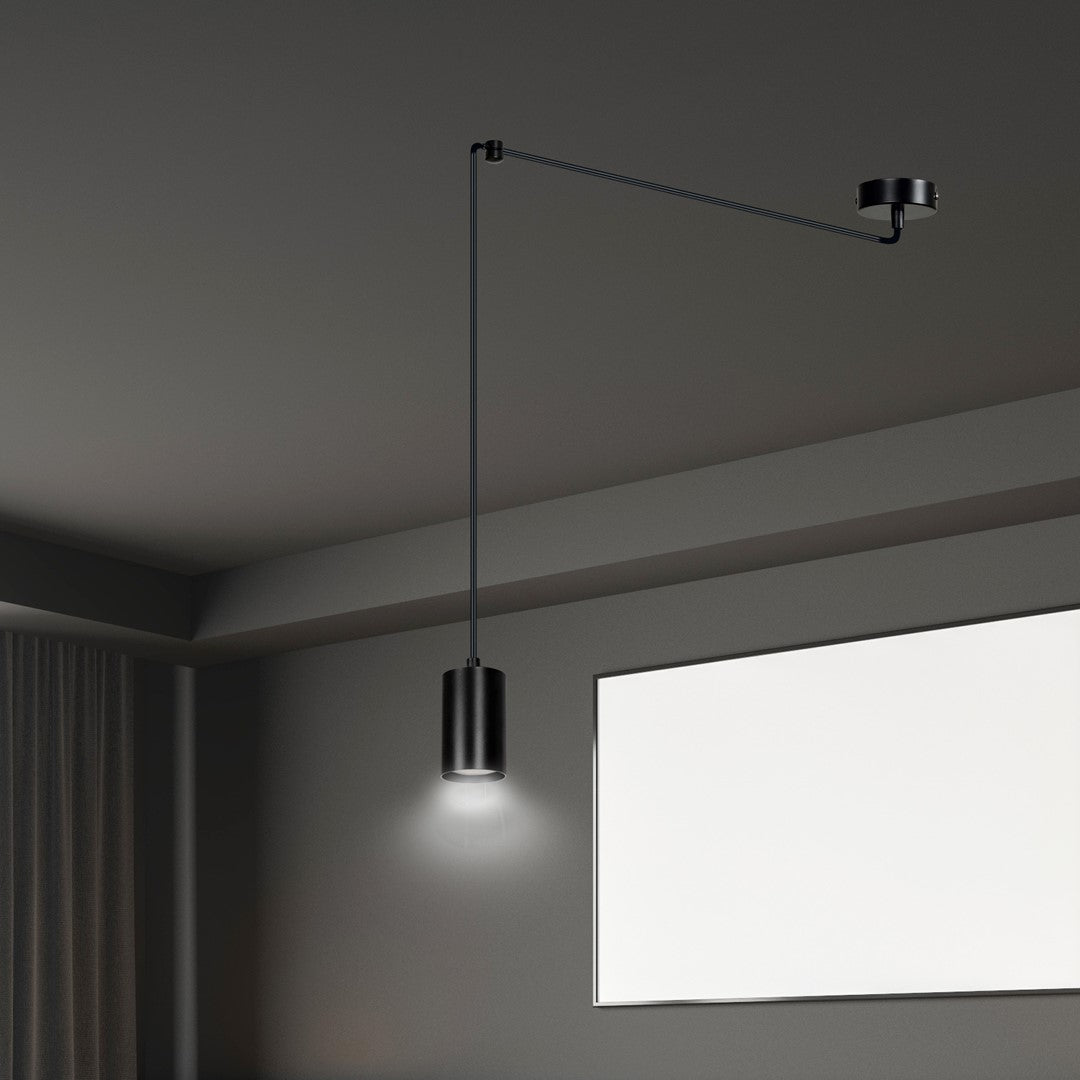 Vue rapprochée du plafond montrant la fixation et le bras déporté noir.