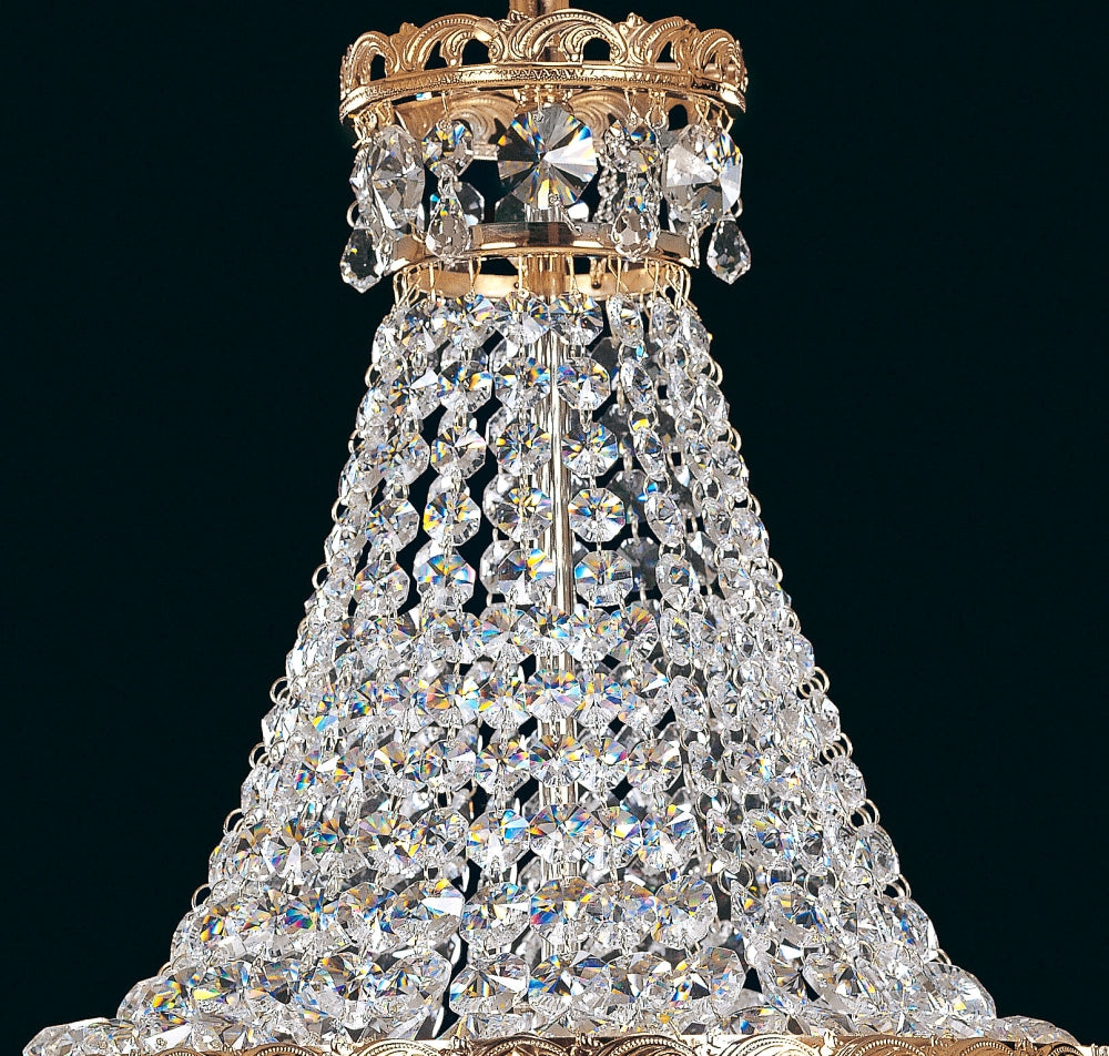 Détail du sommet à fleuron doré et de l'attache métallique de suspension