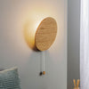 Applique murale Minimal en bois, chêne et noir, Ø 20 cm