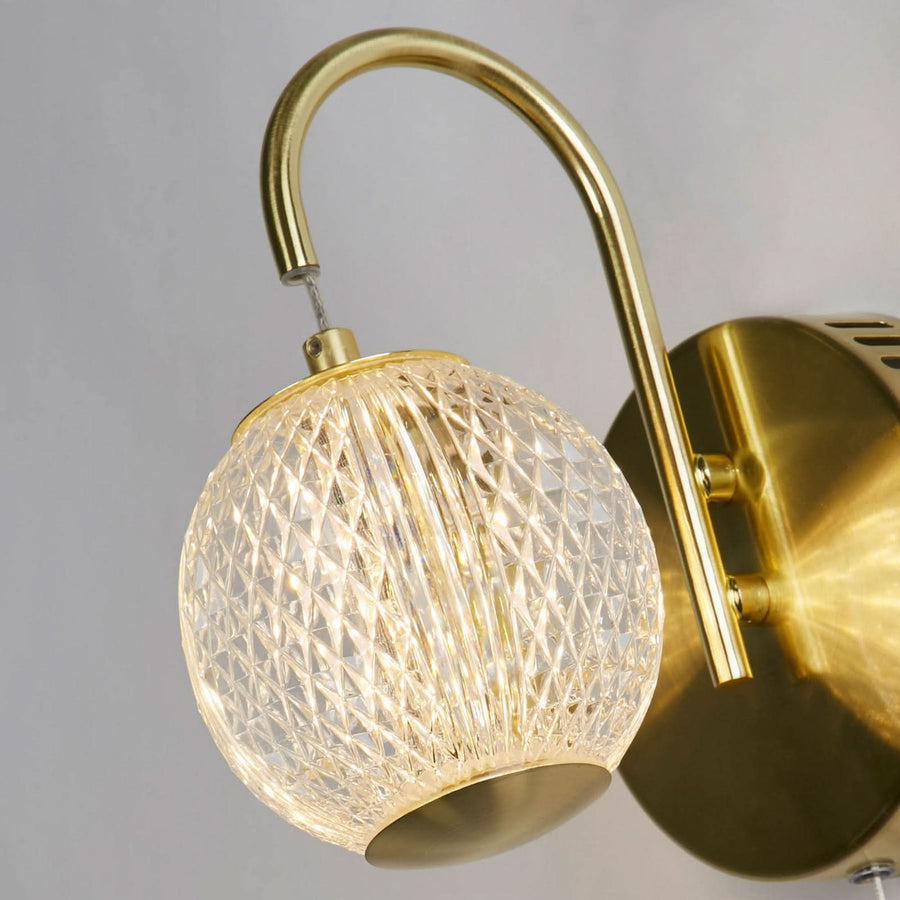 Applique murale LED Allure en acier, laiton et transparent, hauteur 21 cm