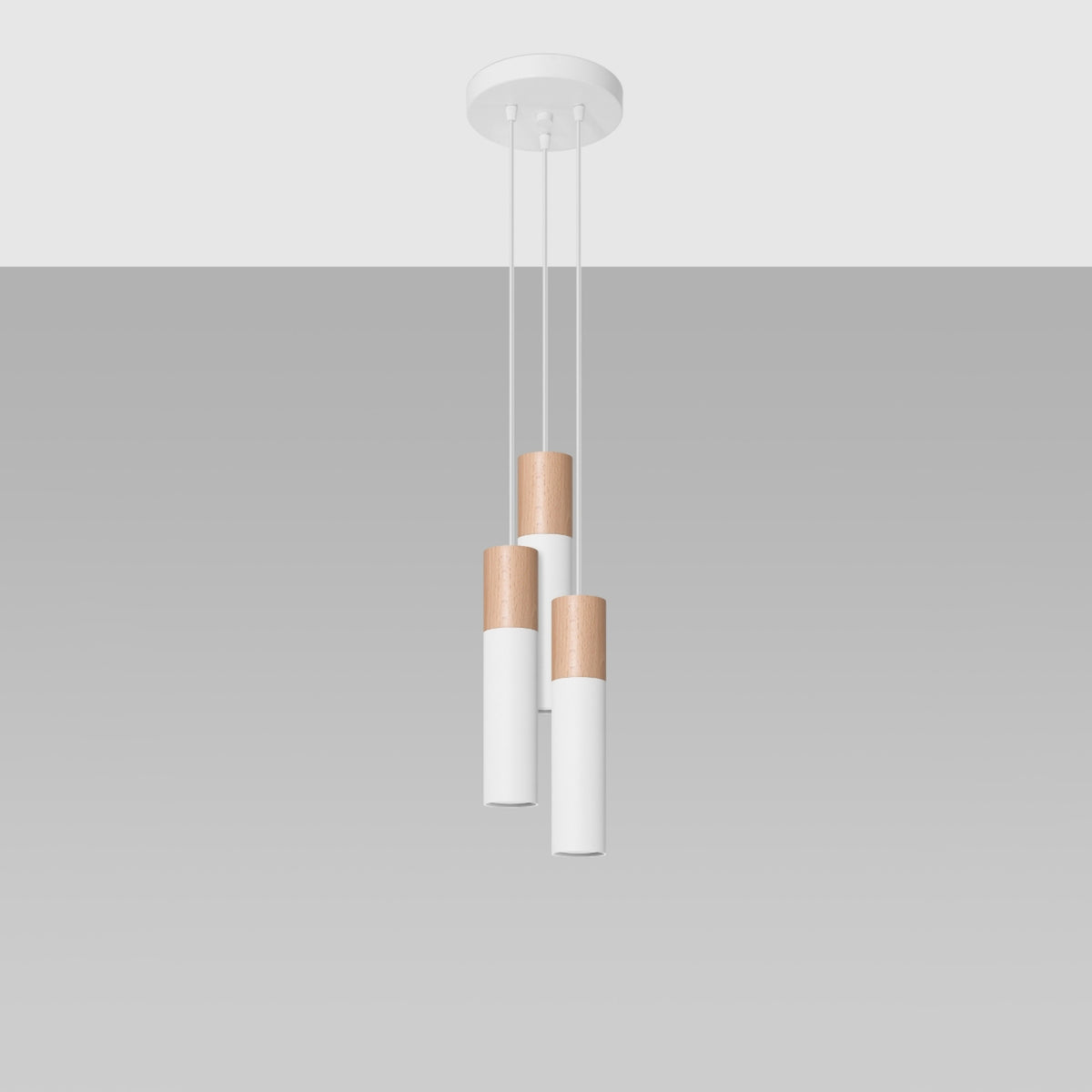 Vue d'ensemble du luminaire avec trois suspensions cylindriques blanc et bois clair