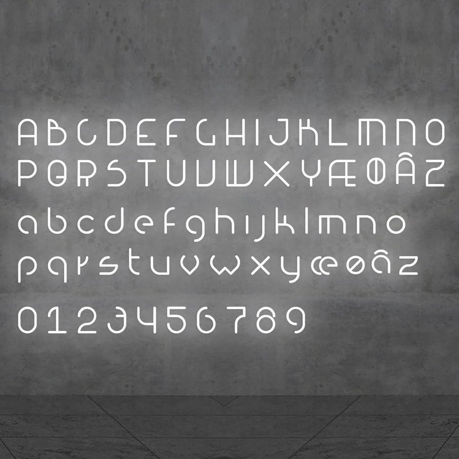 Alphabet complet en lettres et chiffres lumineux blancs sur fond gris