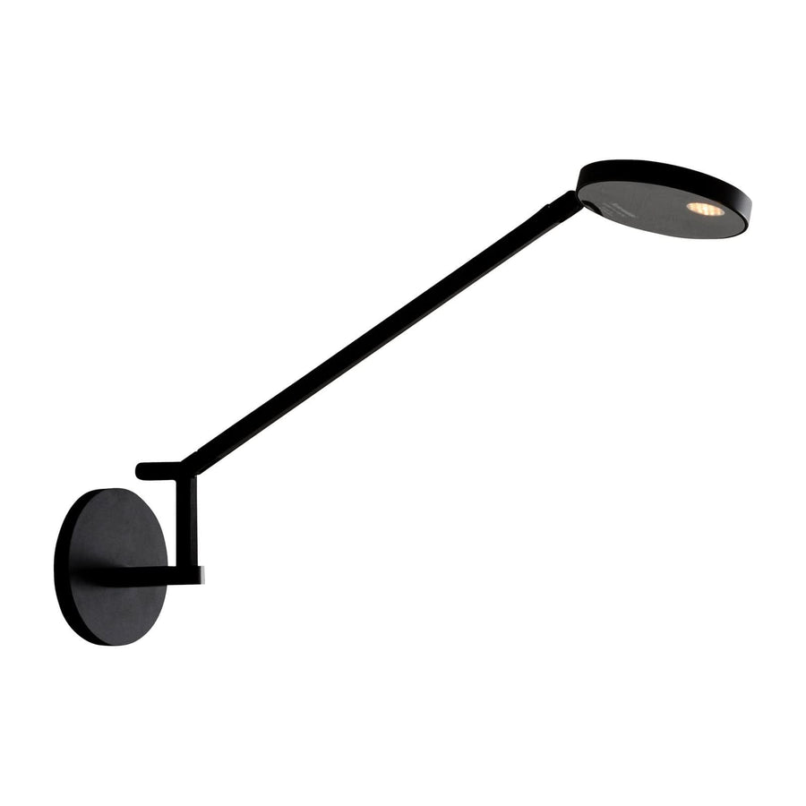 Vue de profil sur fond blanc du luminaire noir avec long bras et tête ronde.