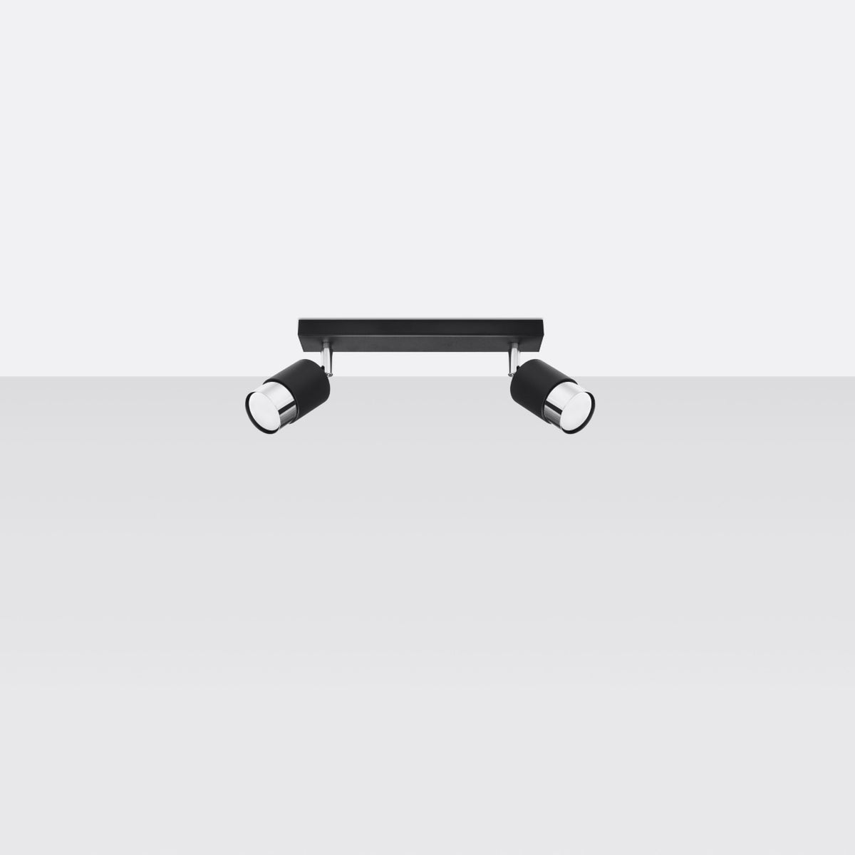 Profil du luminaire sur fond gris, spots orientés vers le bas