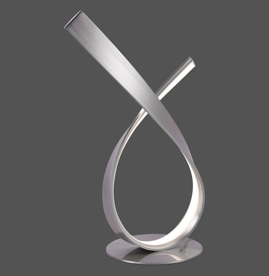 Lampe à poser en acier brossé, ruban torsadé croisé sur fond gris