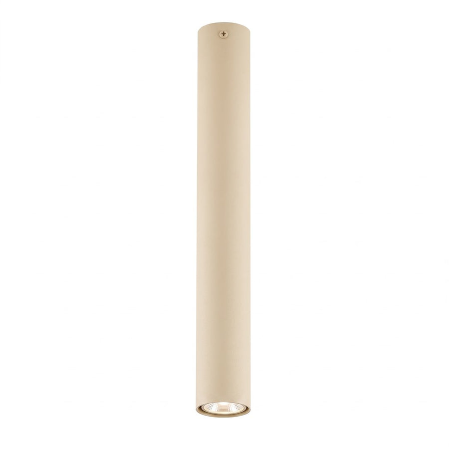 Luminaire cylindrique beige clair vu de face, long tube vertical avec led en partie basse.