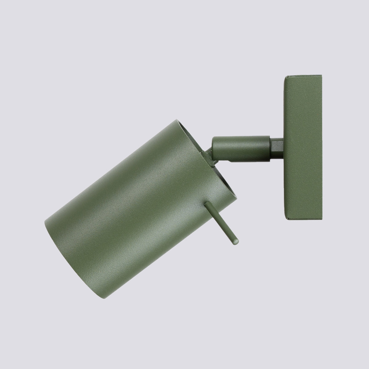 Profil de côté du spot cylindrique vert incliné vers le bas avec sa tige