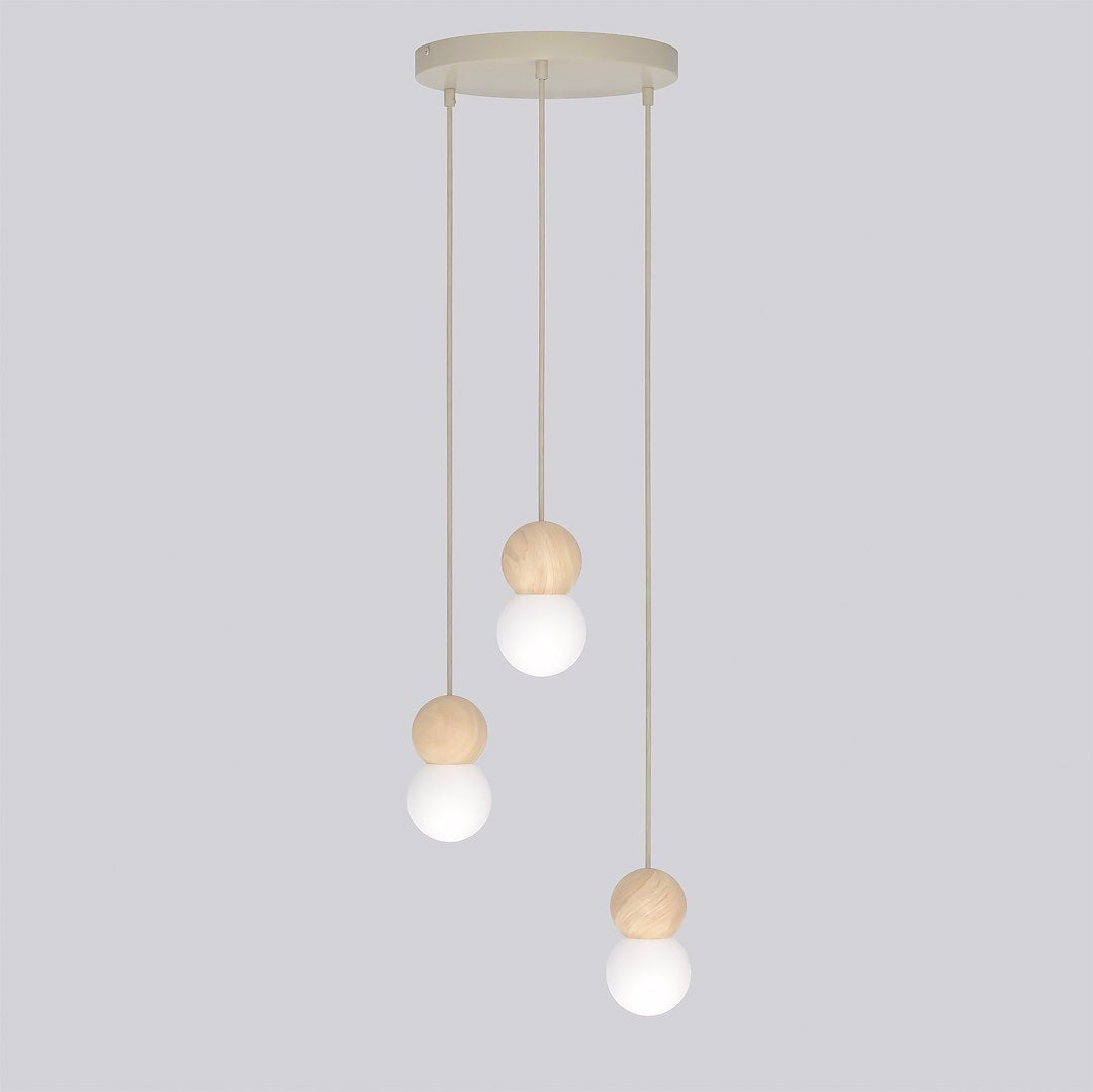 Vue de trois quarts du luminaire, câbles beiges et rosace ronde sur fond gris.