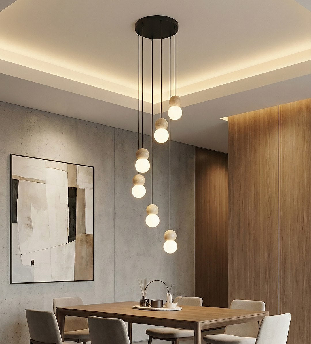 Vue d'ensemble d'une salle à manger moderne avec la suspension allumée au plafond