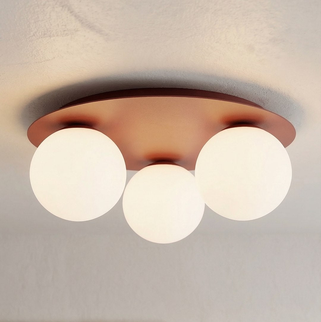 Détail rapproché des globes allumés diffusant une lumière chaude et douce