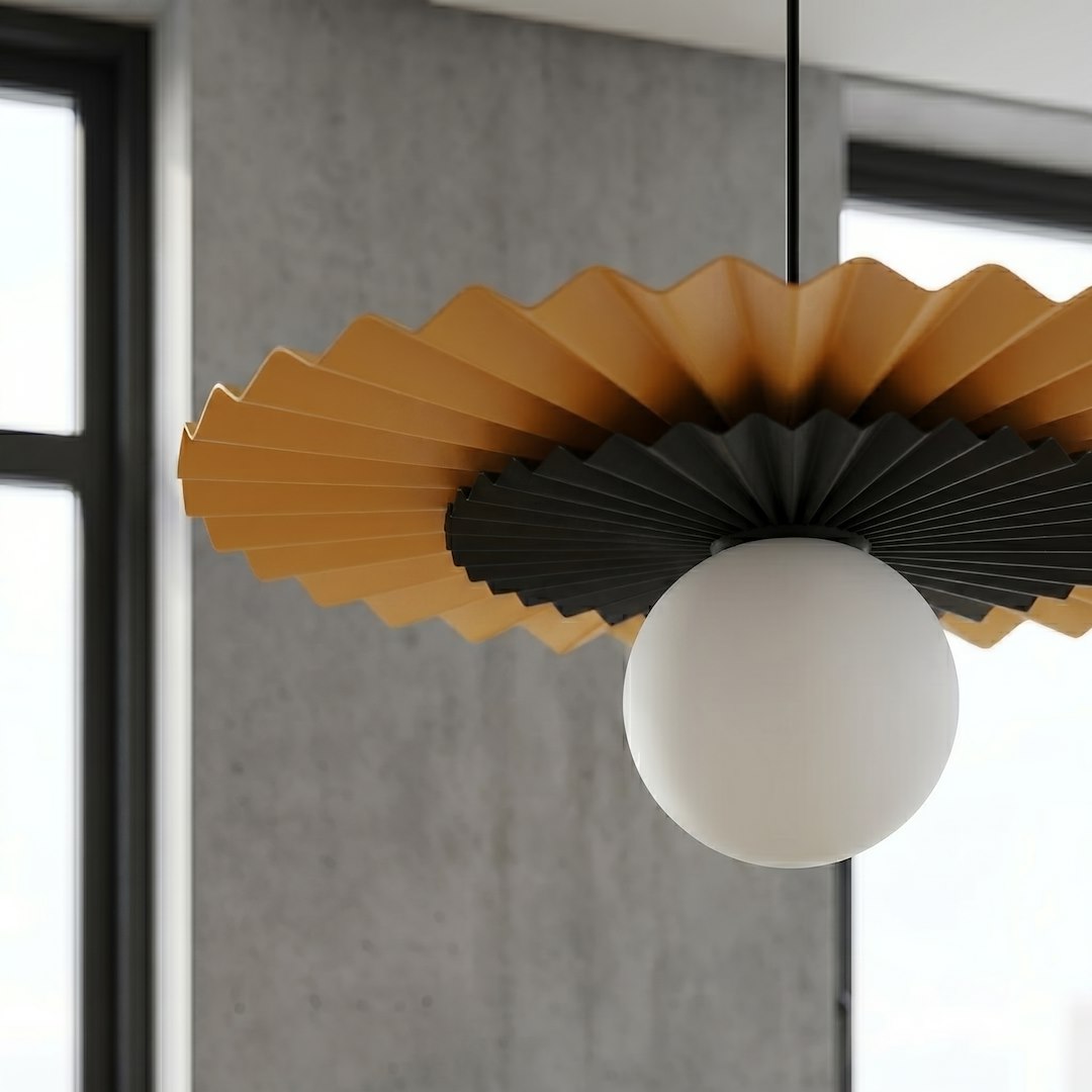Gros plan sur les plis de l'abat-jour orange et noir, globe en verre opalin