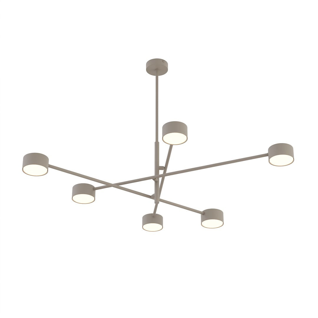 Vue de dessous du luminaire allumé, six diffuseurs ronds disposés en croix